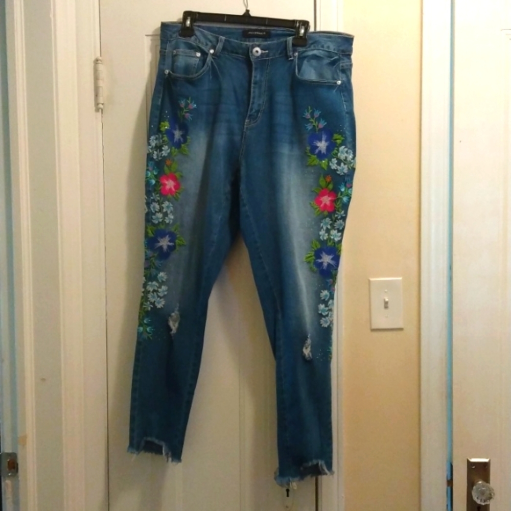 Medium blue denim jeans with flowers and rhinestone by Ashley Stewart size 16.